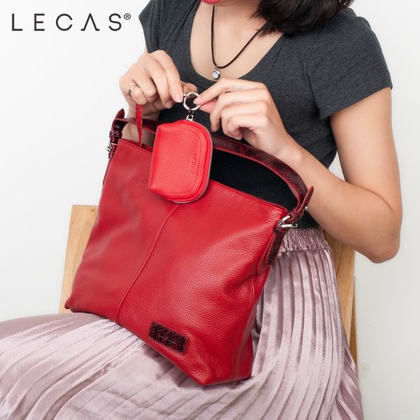 bạn hoàn toàn có thể mix thêm vào một chiếc túi lớn chiếc Ví Treo Chìa Khóa TINY để làm điểm nhấn độc nhất